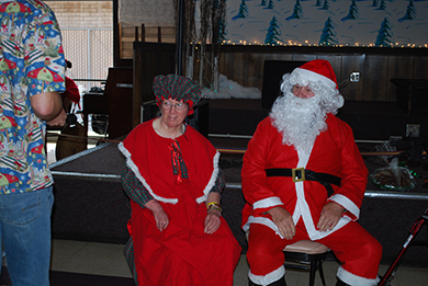 VTC individuals dressed and Mr. and Mrs. Clause