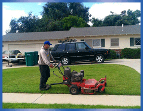 VTC individual mowing residential lawn