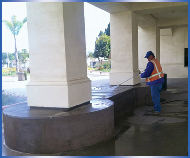 Single VTC indidividual cleaning large pillars at government building